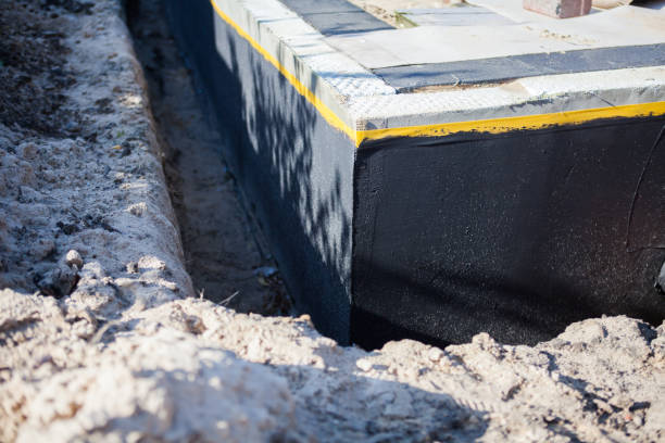 Professional Interior Drainage System technician working in Teaneck, NJ